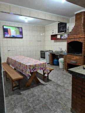 Casa grande e confortável até 16 pessoas com churrasqueira e garagem para 8 carros